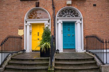 27267650 - vintage georgian doors in yellow and turquoise in dublin