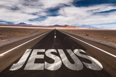 50695217 - jesus written on desert road